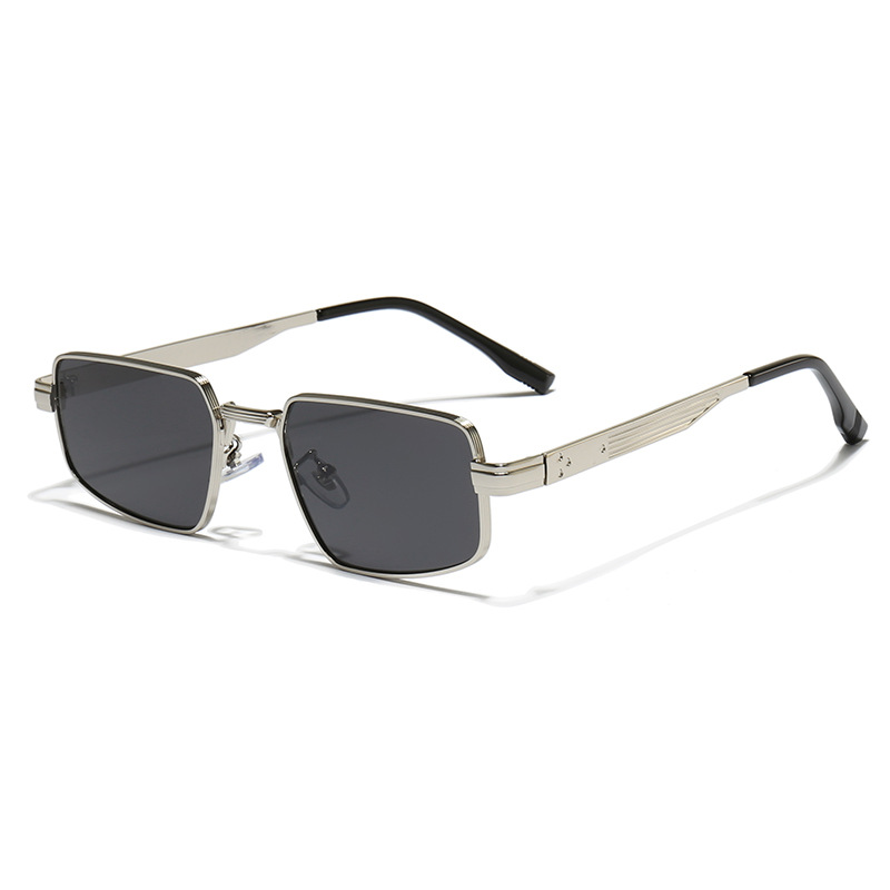 Wholesale trendy rectangular metal frame sunglasses with silver frame and black grey UV400 lenses.